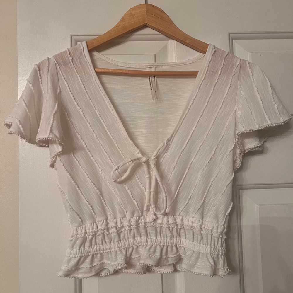 Anthro White Tie Front Blouse XS Ruffle Hem Cottagecore Peplum Top Cute